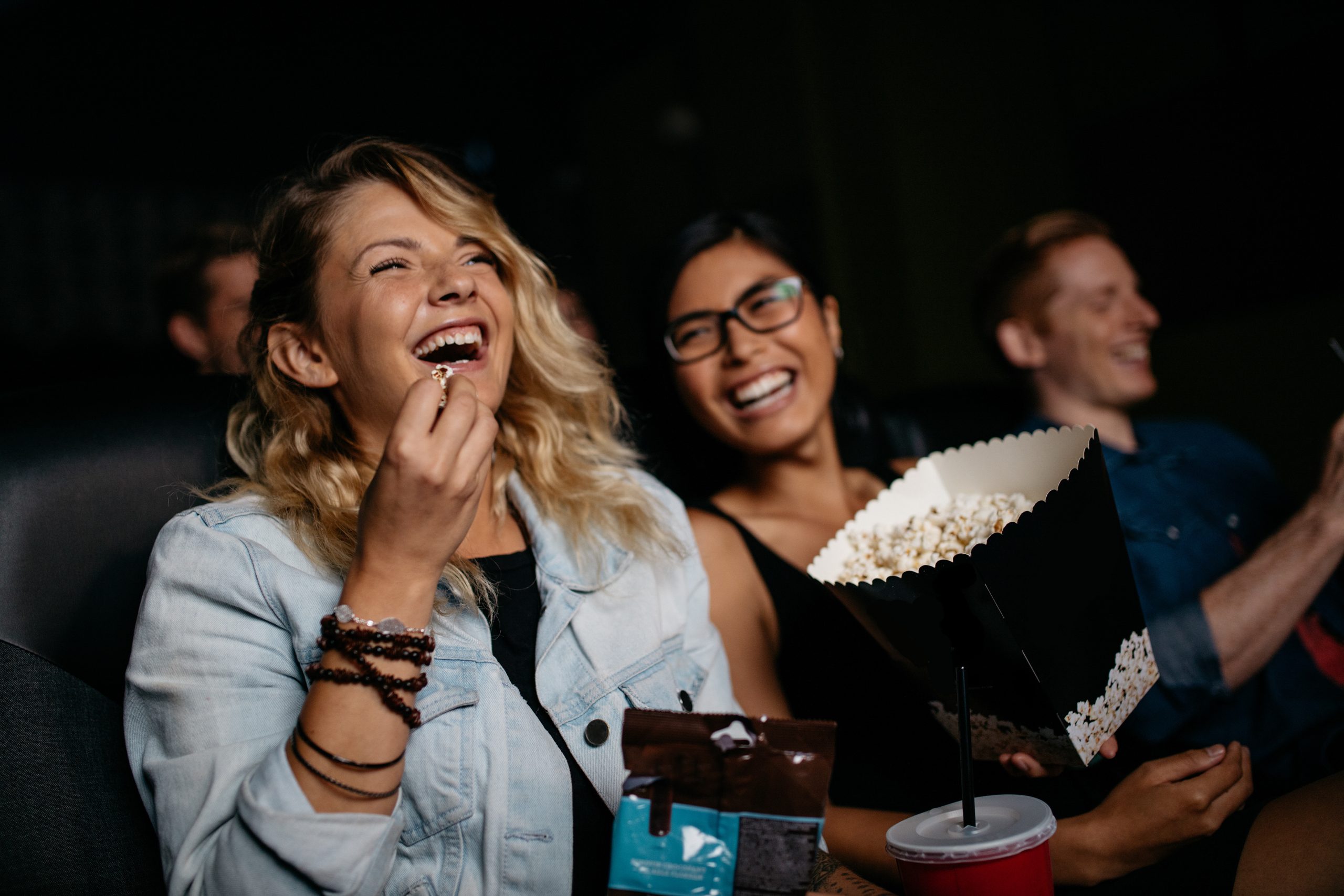 Cinema Audience Eating popcorn