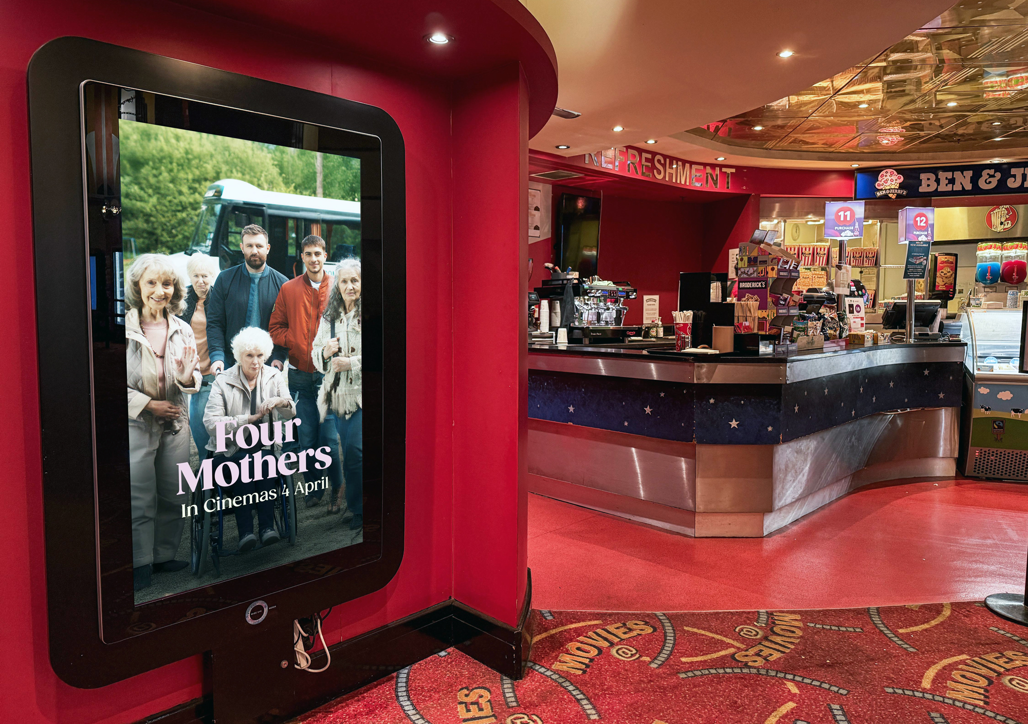 Man walking past DOOH in gym